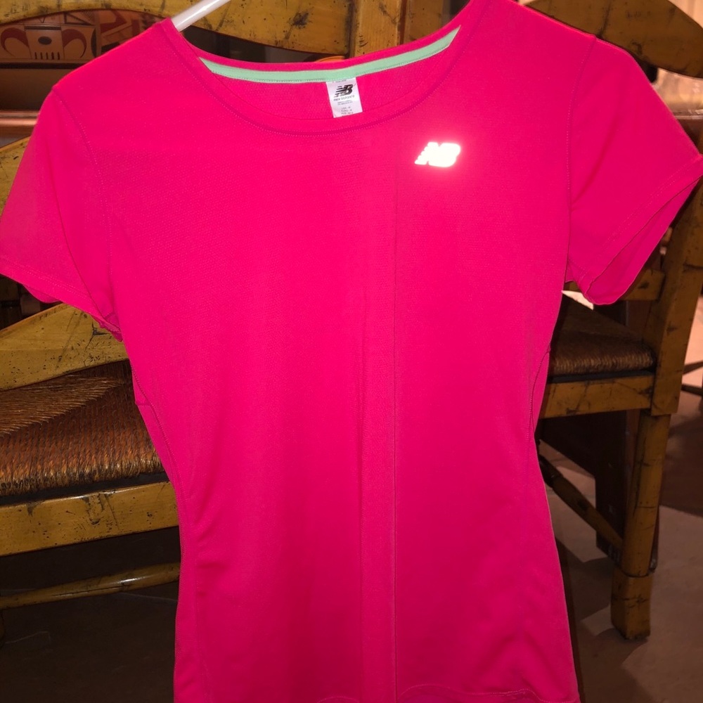 Women’s New Balance dry fit workout t shirt.